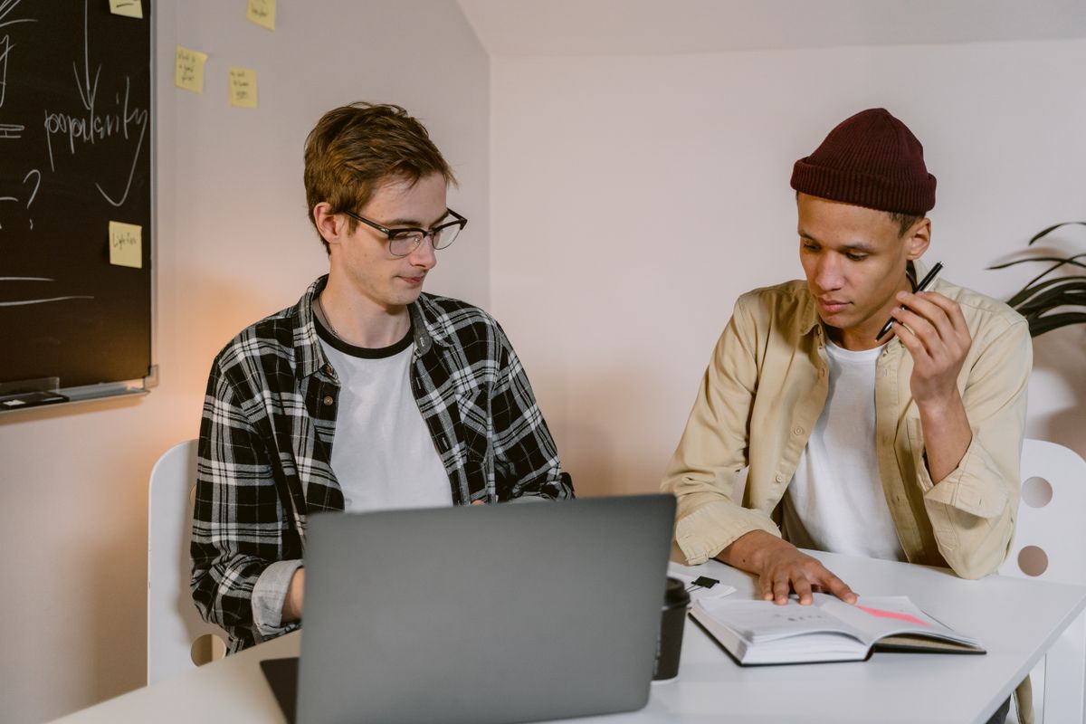 Colleagues working at a shared desk